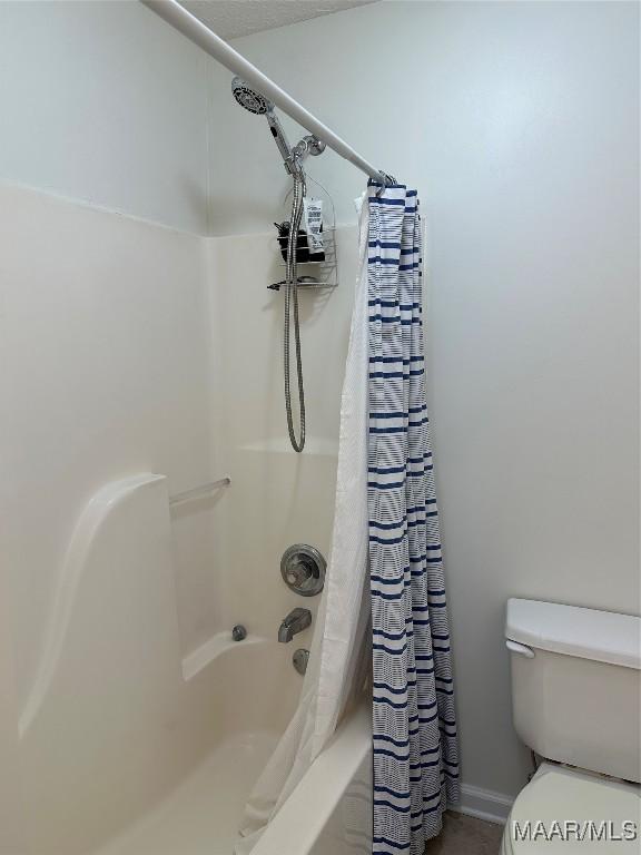414 Warrior Dr, Valley Grande, AL 36701 - full bath with shower / tub combo, toilet, and baseboards