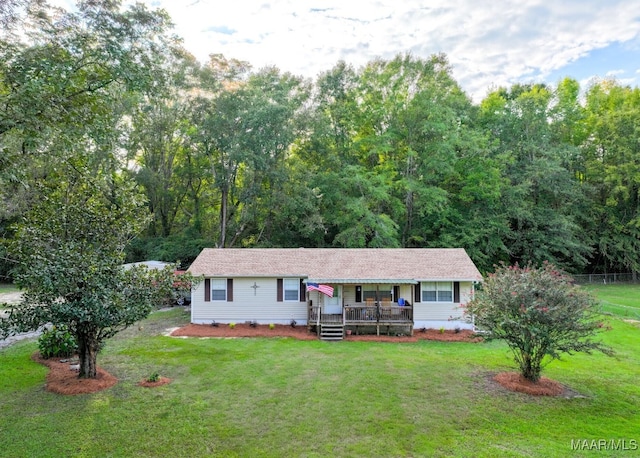 ranch-style house featuring a front lawn