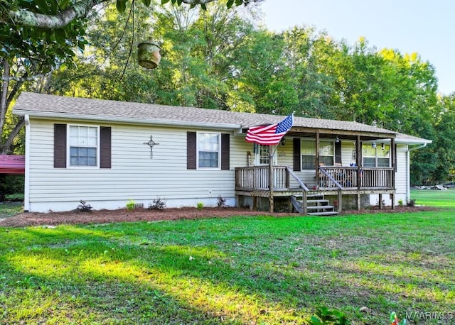 single story home with a porch and a front lawn