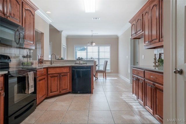 kitchen with light tile patterned flooring, sink, a chandelier, black appliances, and decorative backsplash