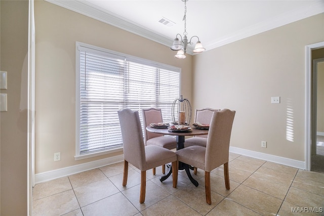 dining space featuring ornamental molding, light tile patterned floors, and a notable chandelier