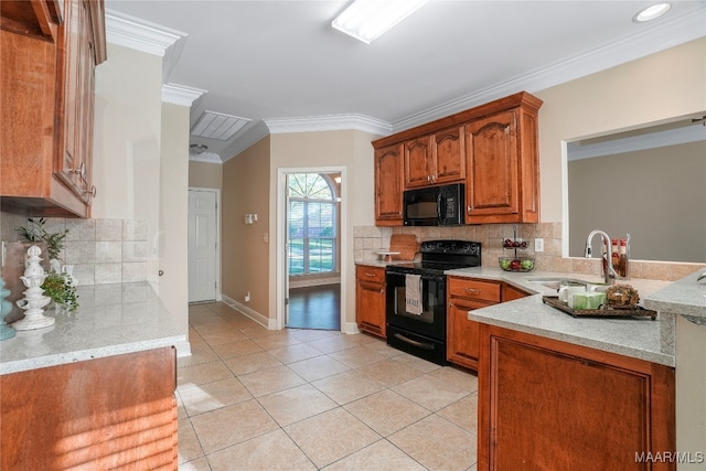 kitchen with sink, decorative backsplash, black appliances, light tile patterned floors, and ornamental molding