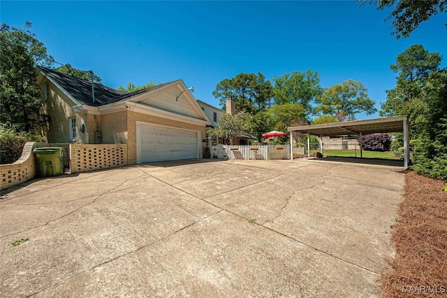 view of side of home featuring a garage