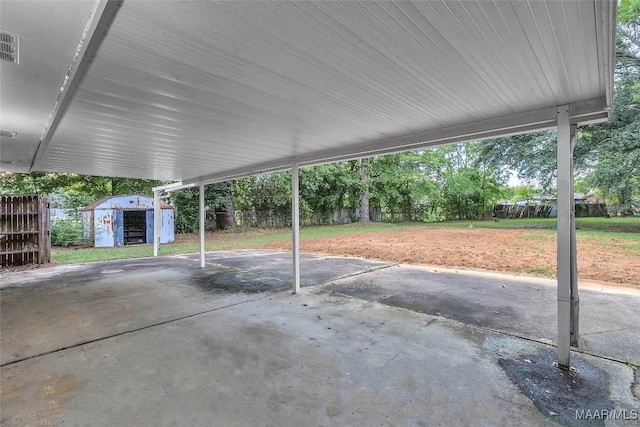 view of patio with a shed