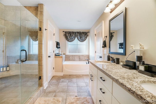 bathroom with vanity, plus walk in shower, and tile patterned floors