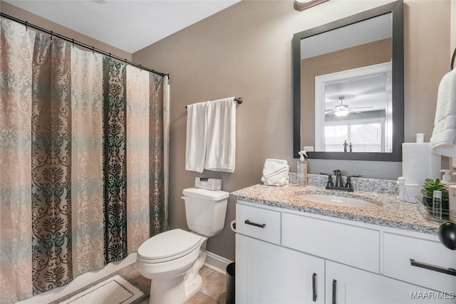 bathroom featuring tile patterned flooring, a shower with shower curtain, ceiling fan, vanity, and toilet