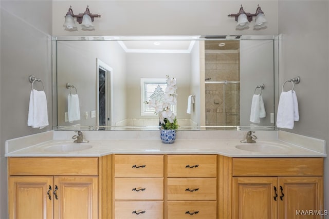 bathroom featuring ornamental molding, walk in shower, and vanity