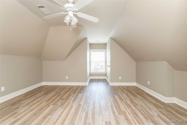 bonus room featuring lofted ceiling, ceiling fan, and light hardwood / wood-style flooring