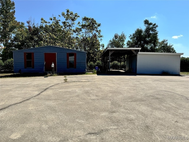 exterior space with a carport