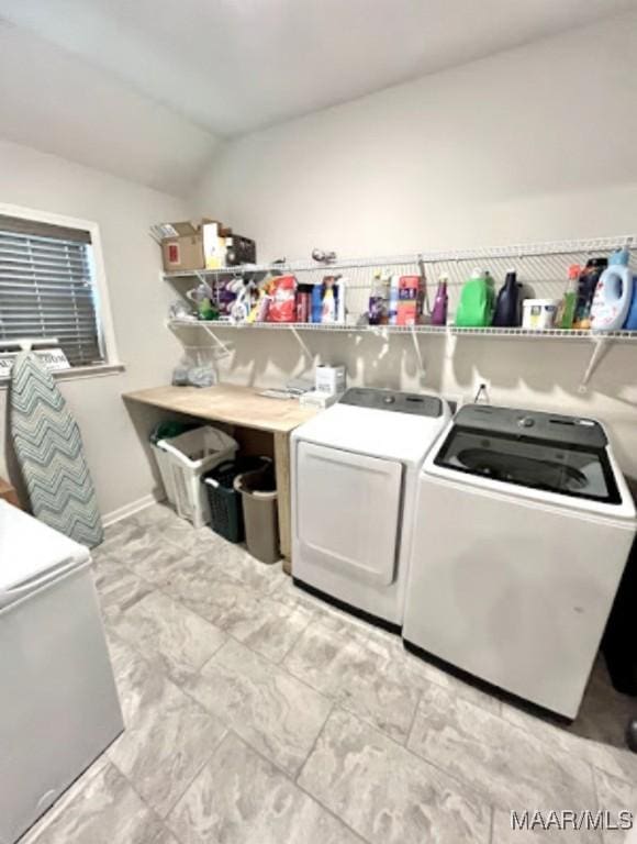 laundry area with washer and dryer