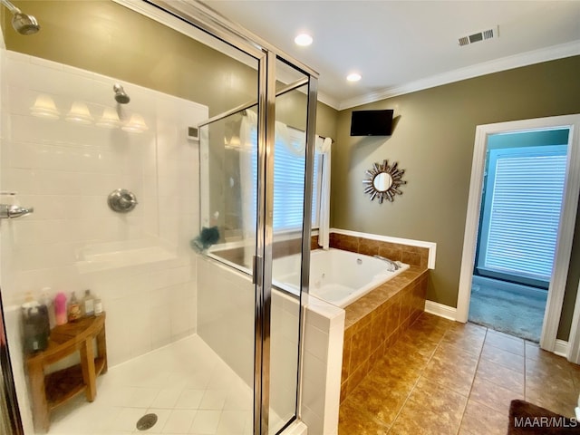 bathroom with tile patterned flooring, crown molding, and separate shower and tub