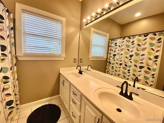 bathroom featuring vanity and tile patterned flooring