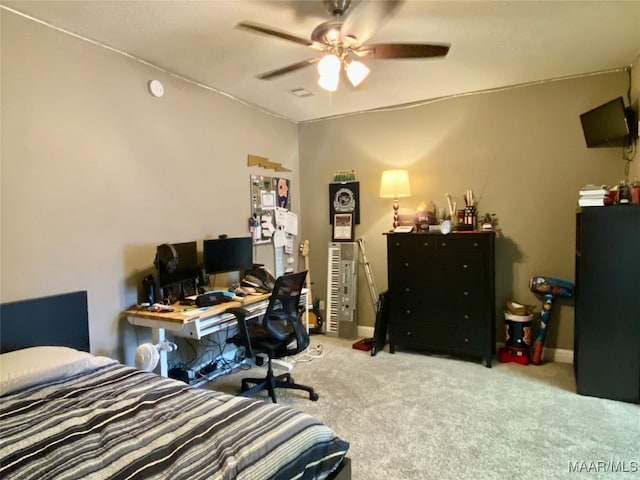 bedroom with light carpet and ceiling fan