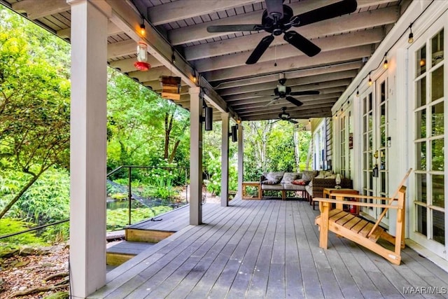 1311 Woodward Ave, Montgomery, AL 36106 - wooden deck with a ceiling fan and view of wooded area