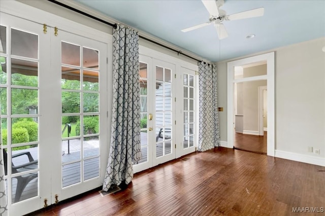 1311 Woodward Ave, Montgomery, AL 36106 - entryway with french doors, wood finished floors, and baseboards