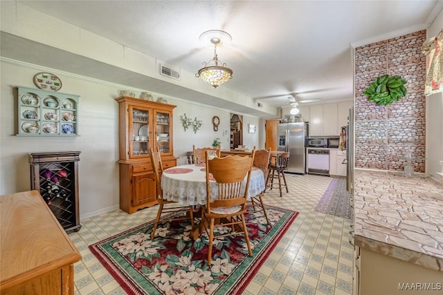 dining room with crown molding