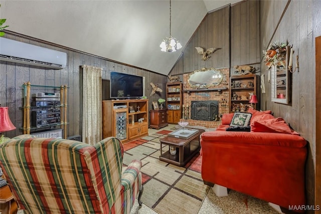 living room featuring an inviting chandelier, a wall mounted AC, wood walls, vaulted ceiling, and a fireplace