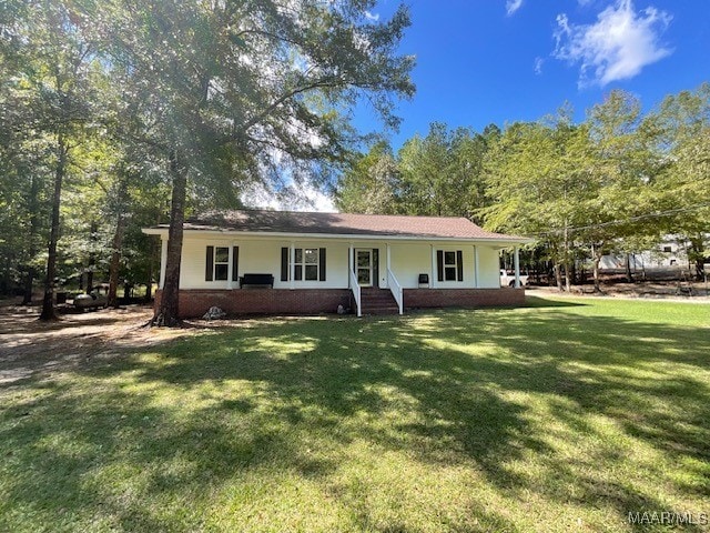 ranch-style house with covered porch and a front yard