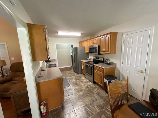 kitchen with stainless steel appliances and sink