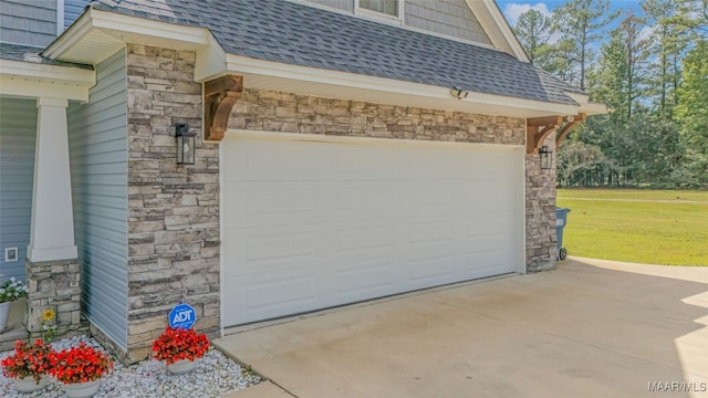 garage with a lawn