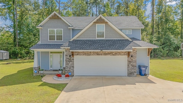 craftsman-style house featuring a front lawn and a garage