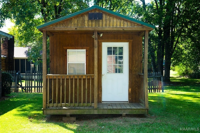 view of outdoor structure with a yard