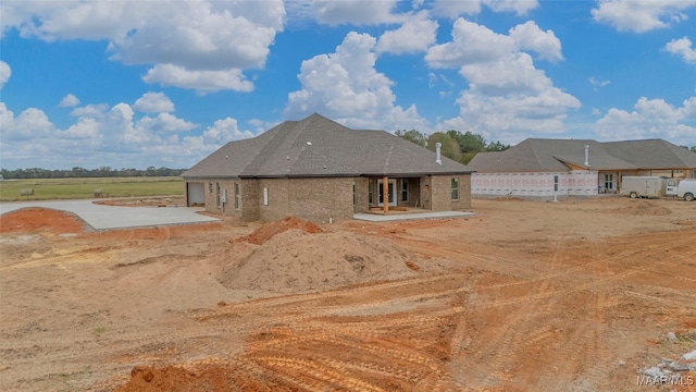 back of property with a patio area