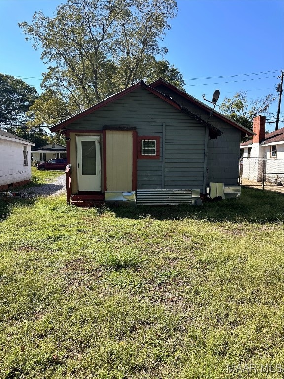 exterior space with a yard