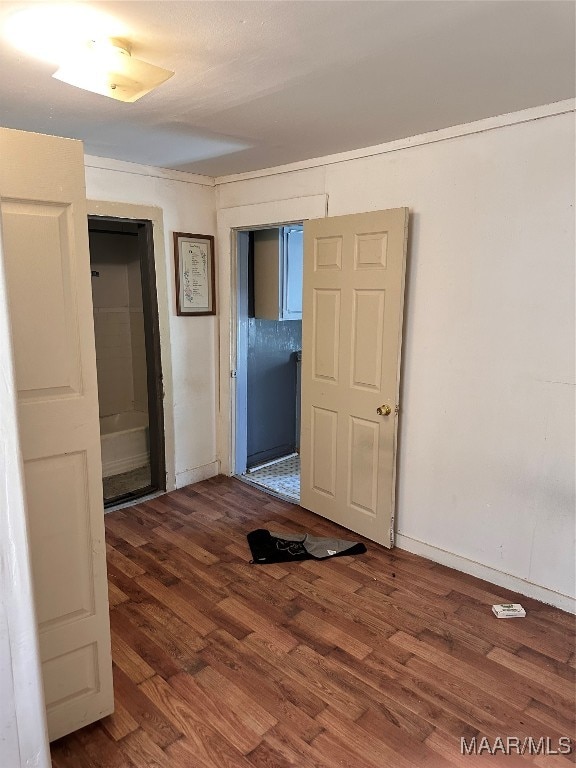 empty room featuring hardwood / wood-style floors