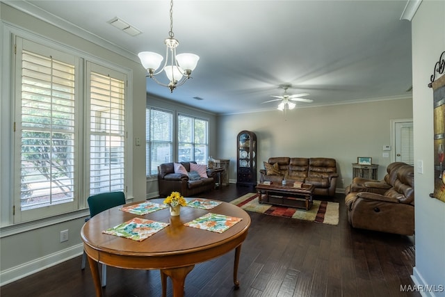 dining space featuring ceiling fan with notable chandelier, dark hardwood / wood-style floors, and ornamental molding