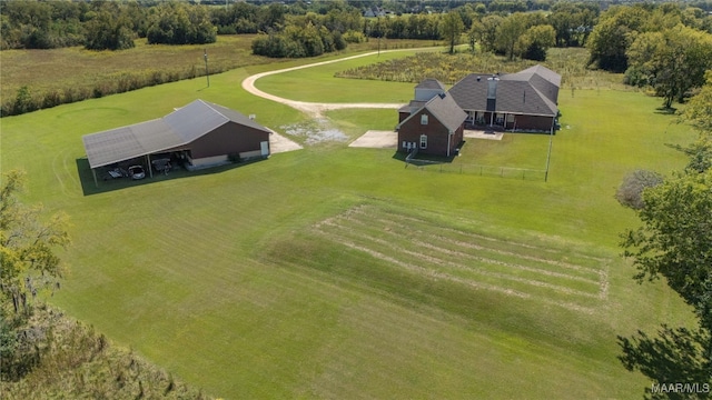 birds eye view of property featuring a rural view