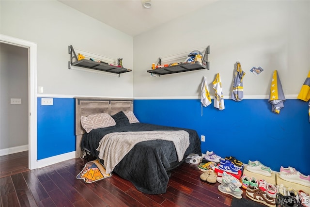 bedroom featuring hardwood / wood-style floors