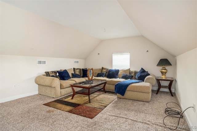 living room with carpet floors and vaulted ceiling