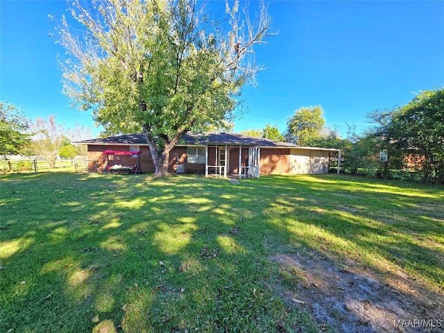 exterior space featuring a lawn