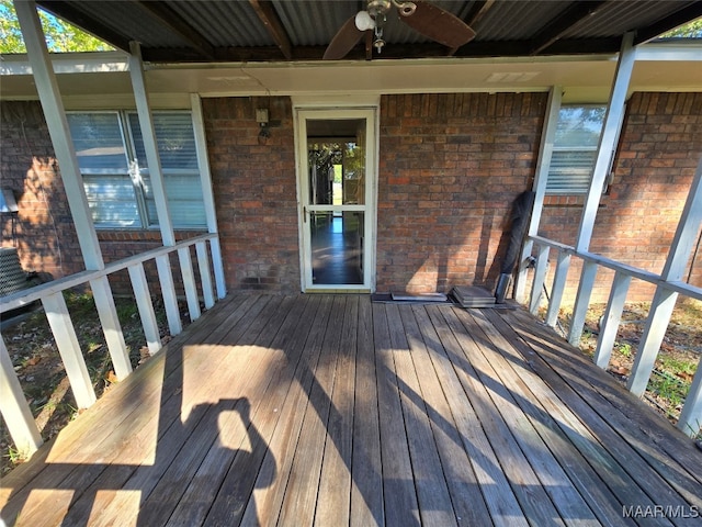 wooden deck with ceiling fan