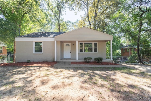 ranch-style home with a porch