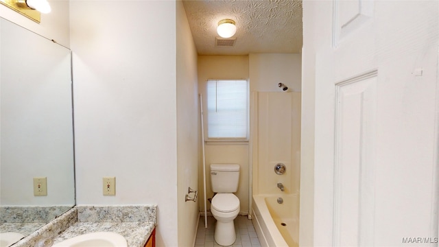 full bathroom with bathtub / shower combination, a textured ceiling, toilet, vanity, and tile patterned floors