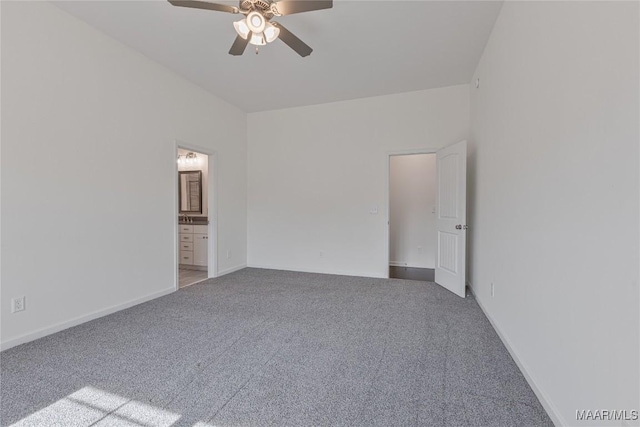 carpeted empty room with ceiling fan