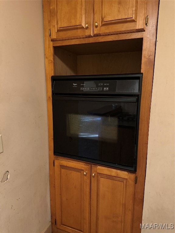 interior details featuring black oven