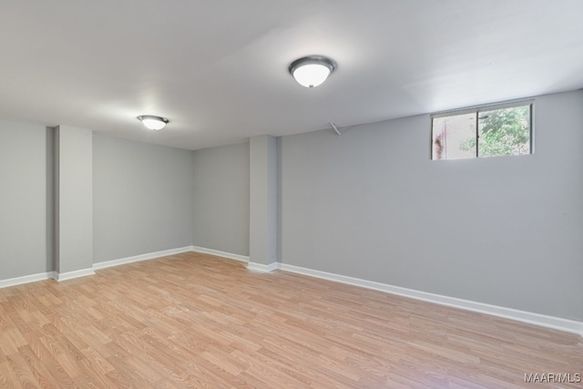 basement featuring light wood-type flooring