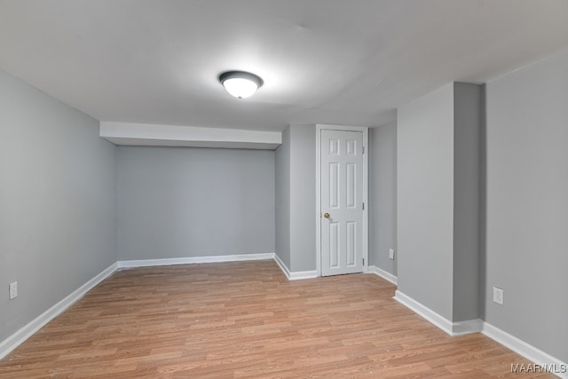 basement featuring light hardwood / wood-style flooring