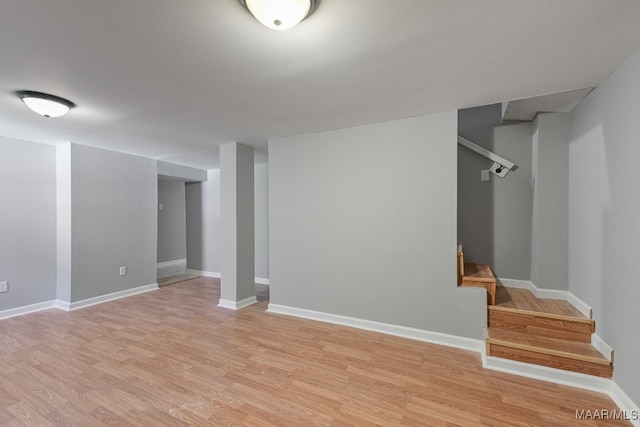 basement featuring light hardwood / wood-style flooring