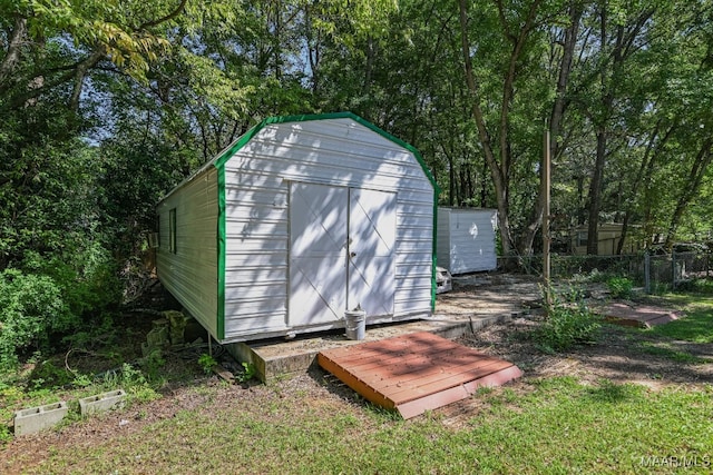 view of outdoor structure with a yard