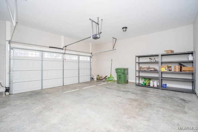 garage featuring a garage door opener