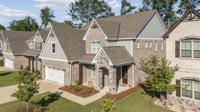 view of front of home featuring a front lawn and a garage