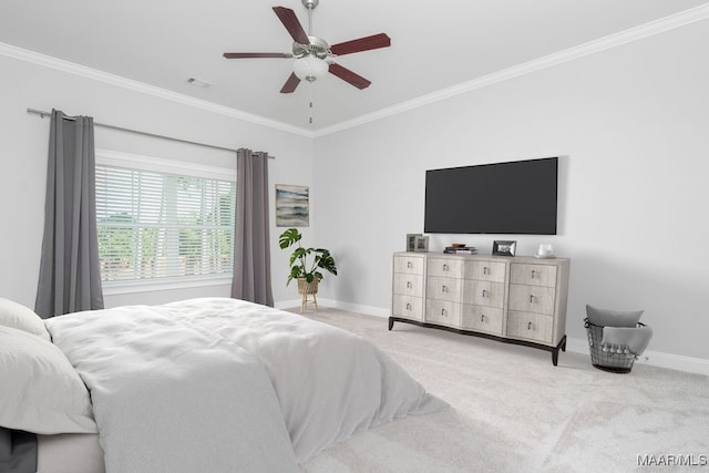 bedroom featuring light carpet, ornamental molding, and ceiling fan