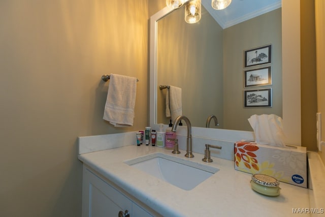 bathroom featuring vanity and crown molding