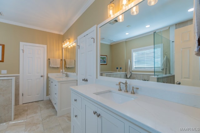 bathroom featuring ornamental molding, tile patterned floors, and vanity