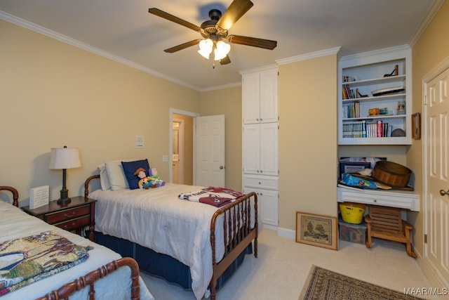 carpeted bedroom with ceiling fan, a closet, and ornamental molding