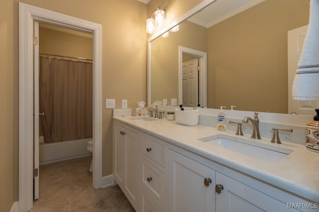 full bathroom featuring vanity, toilet, ornamental molding, shower / bath combo with shower curtain, and tile patterned flooring